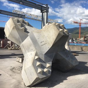 An ACCROPODETM II armour unit for breakwaters, freshly demoulded in the precast plant APS designed for SCPR in La Réunion, France.