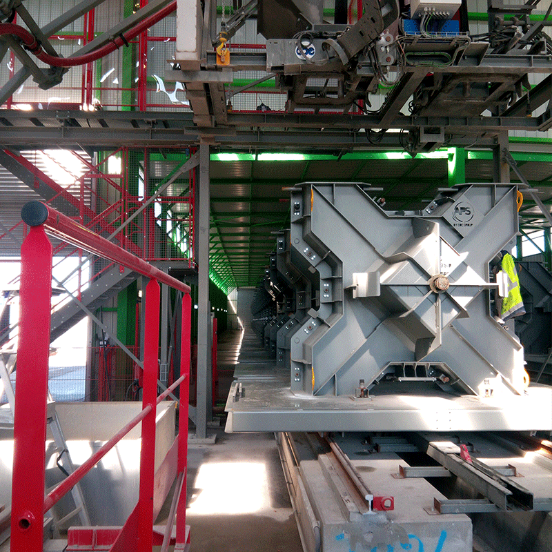 X-Bloc® armour unit moulds arriving at the concreting station of the automated plant provided by APS in Calais.